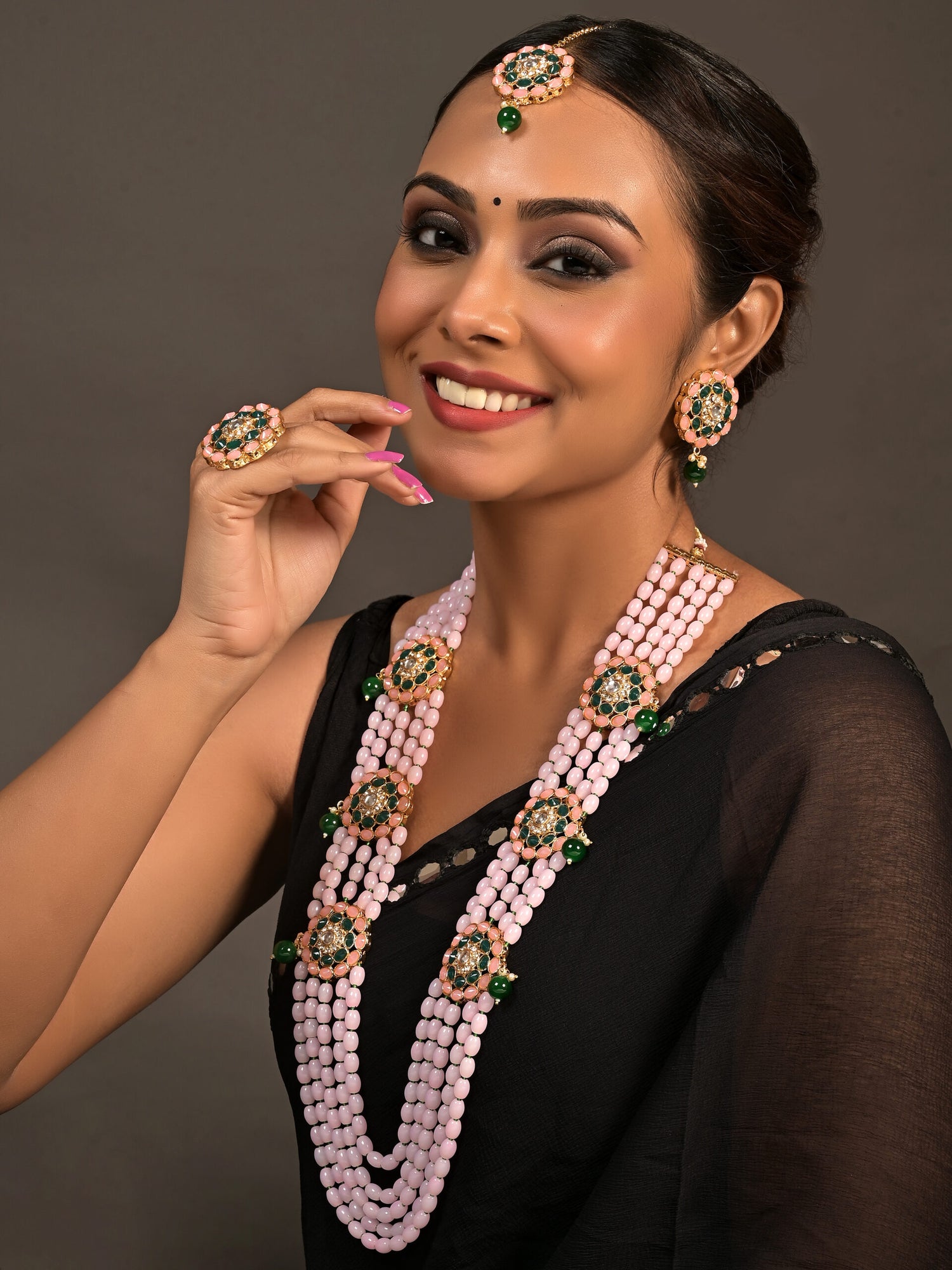 Necklace set with earings and mang tika and finger ring