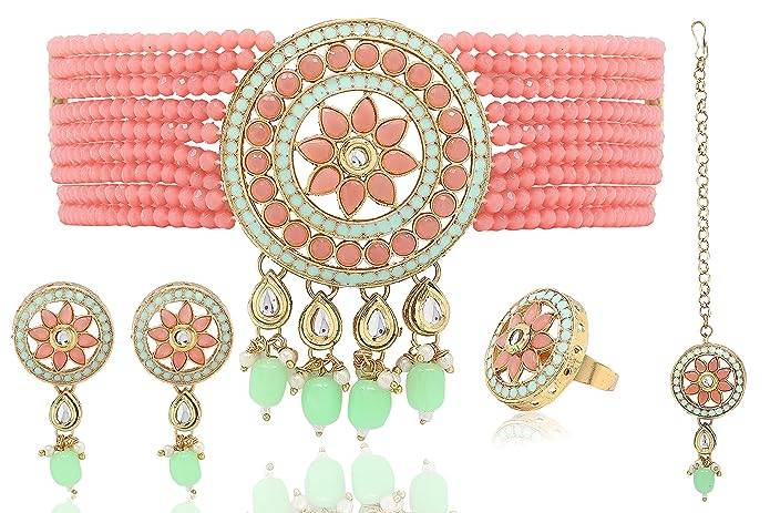 gold plated patwa set in peach and pista colour